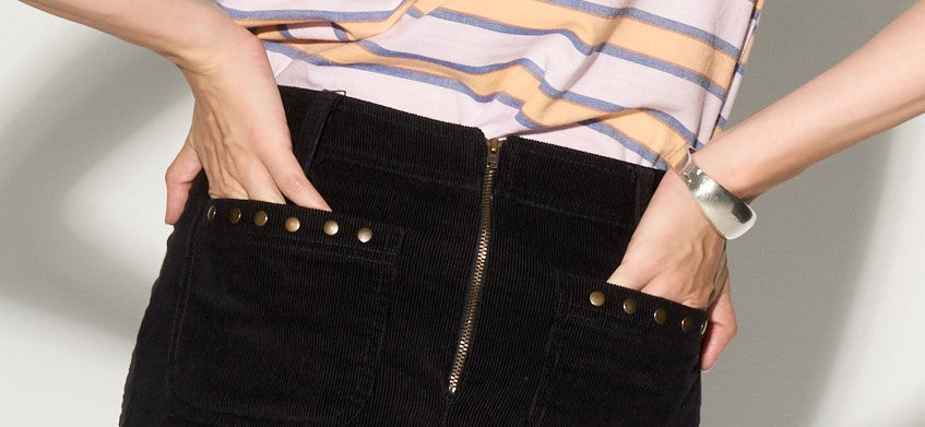 ARMANDE Cord mini skirt with studs - black